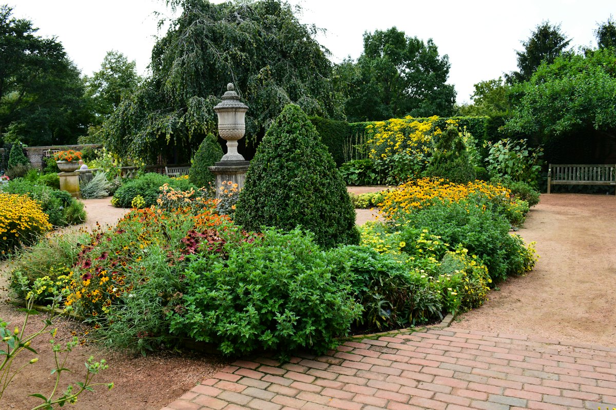 Colourful borders beside a paved path